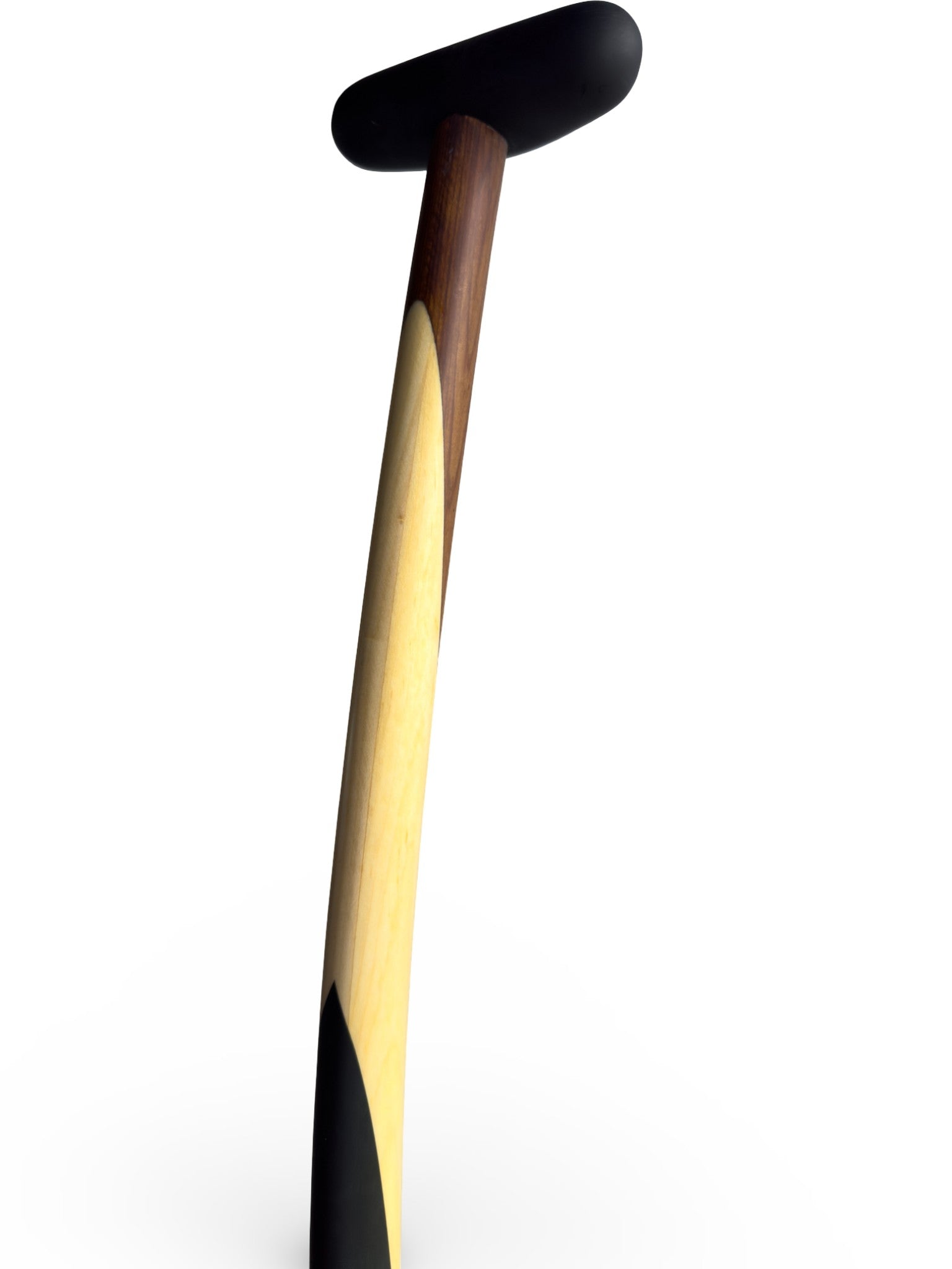 Closed up image of a wooden paddle with black and wood design on a white background